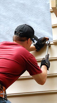 Man Working On Roof