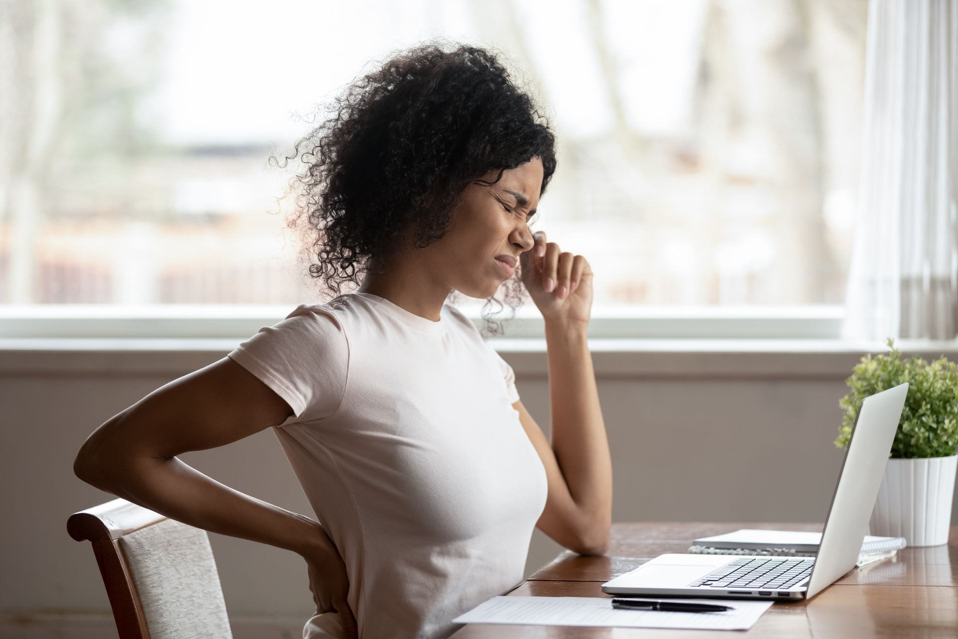 woman suffering back pain