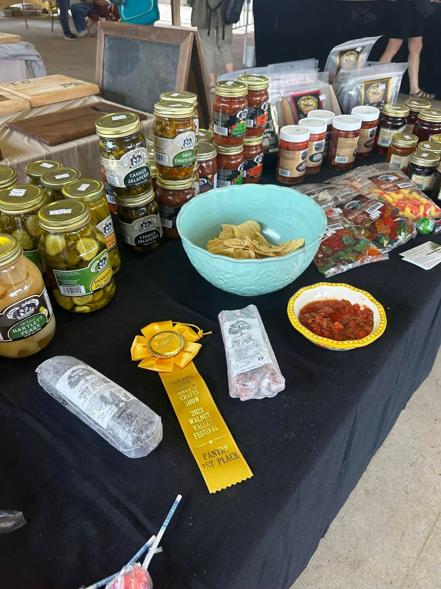 1st place award on table with cans and jars of specialty foods
