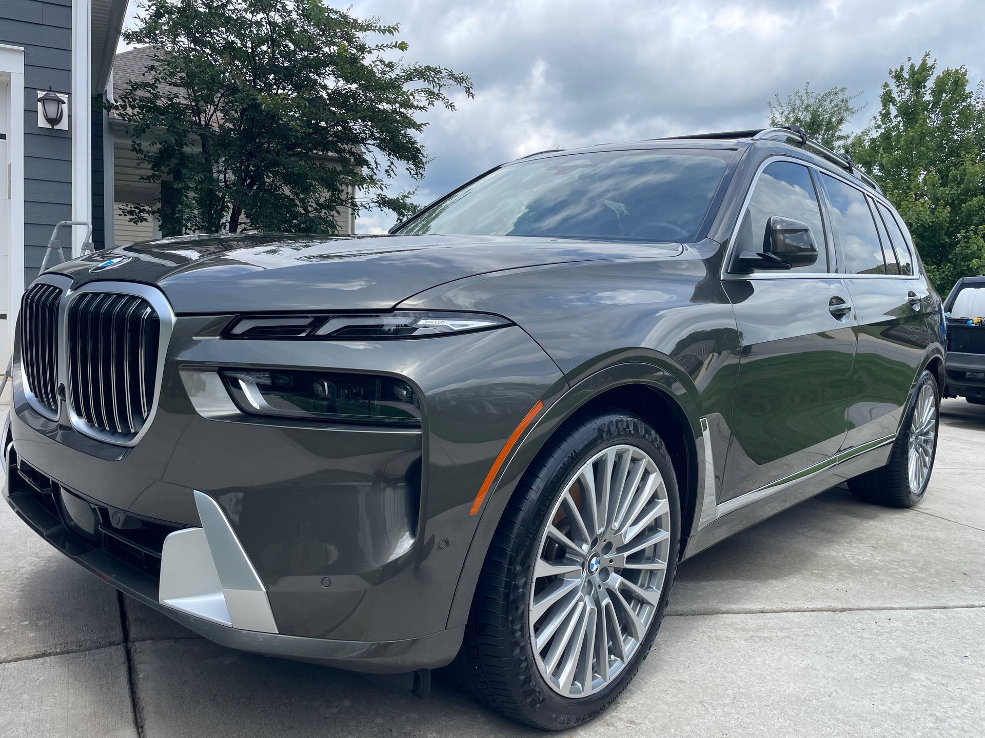 White Ram pickup truck with black trim and tinted windows.