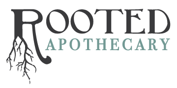 rooted apothecary logo with roots under r
