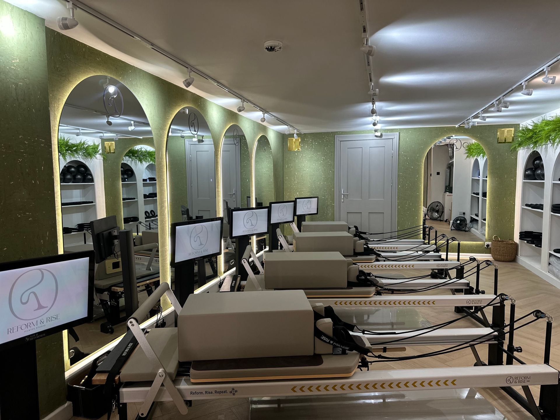 Reform & Rise Pilates studio interior showing reformer machines in Bow East London