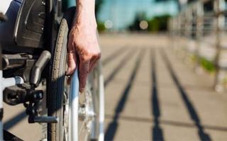 Social Security— Hand Rolling a Wheelchair in Pensacola, FL