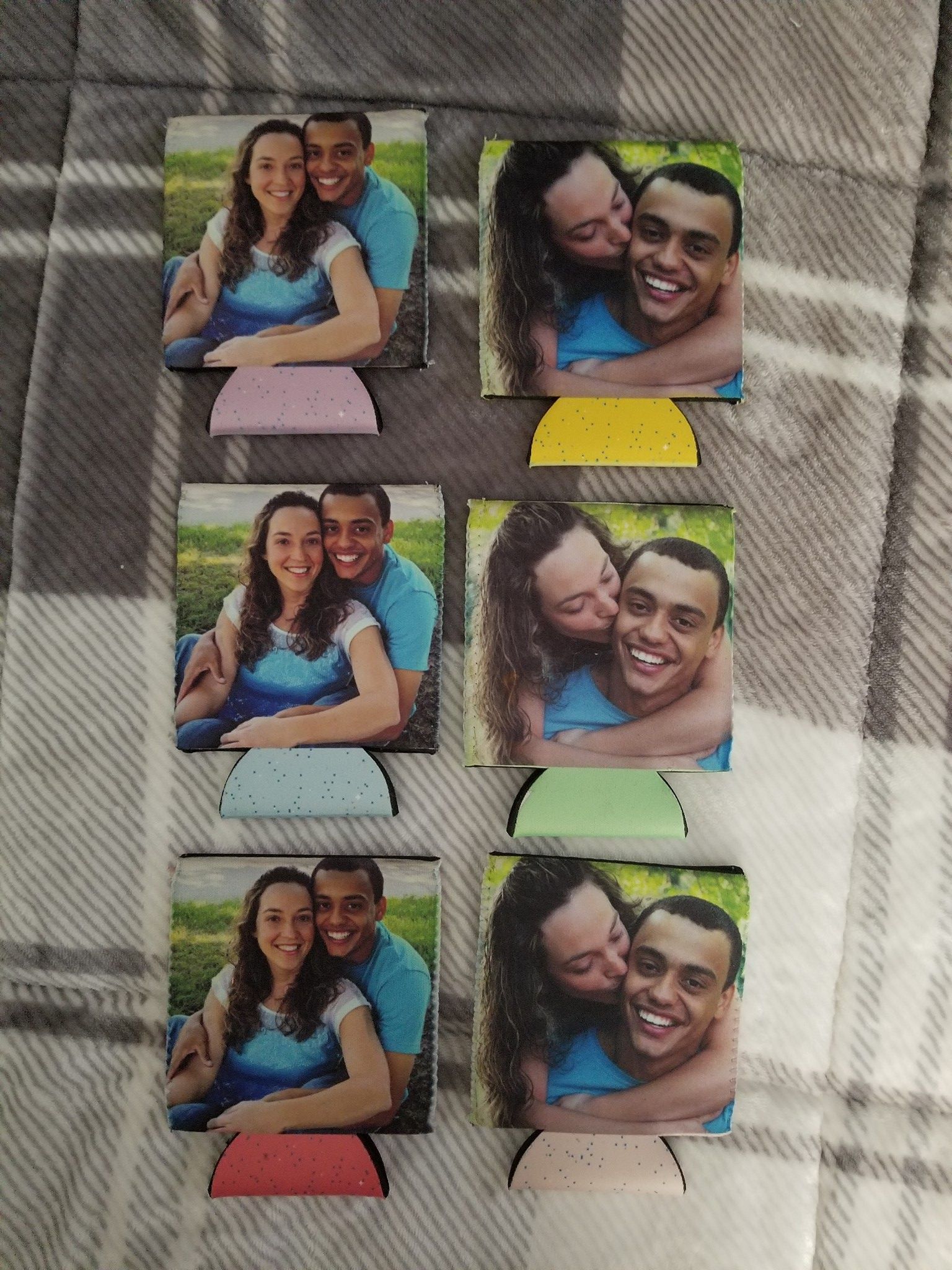 Six personalized drink holders with photos of a couple. Each holder has a different color base.