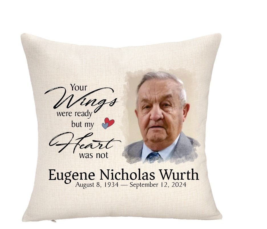 Cushion with photo and text, memorializing Eugene Nicholas Wurth. Includes dates and quote, 