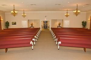 Interior view with seating and beautiful interior at Heritage Funeral Home & Cremation Services, LLC.