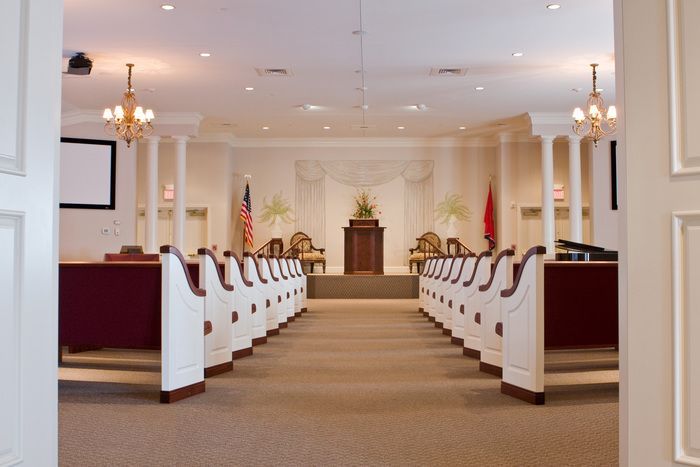 Interior view with seating and beautiful interior at Heritage Funeral Home & Cremation Services, LLC.