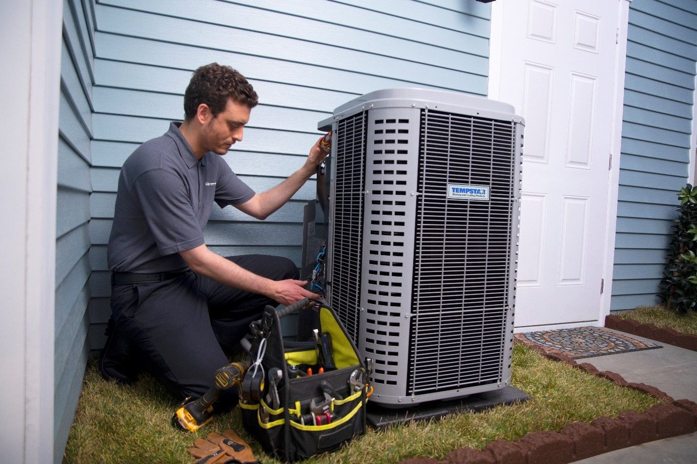 Close-up of a Tempstar technician offering AC repair services.