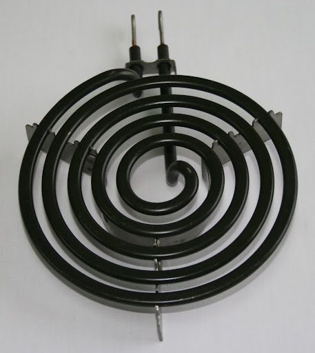 A black spiral with two wires attached to it