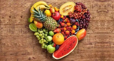 Fruits arranged in a heart shape.