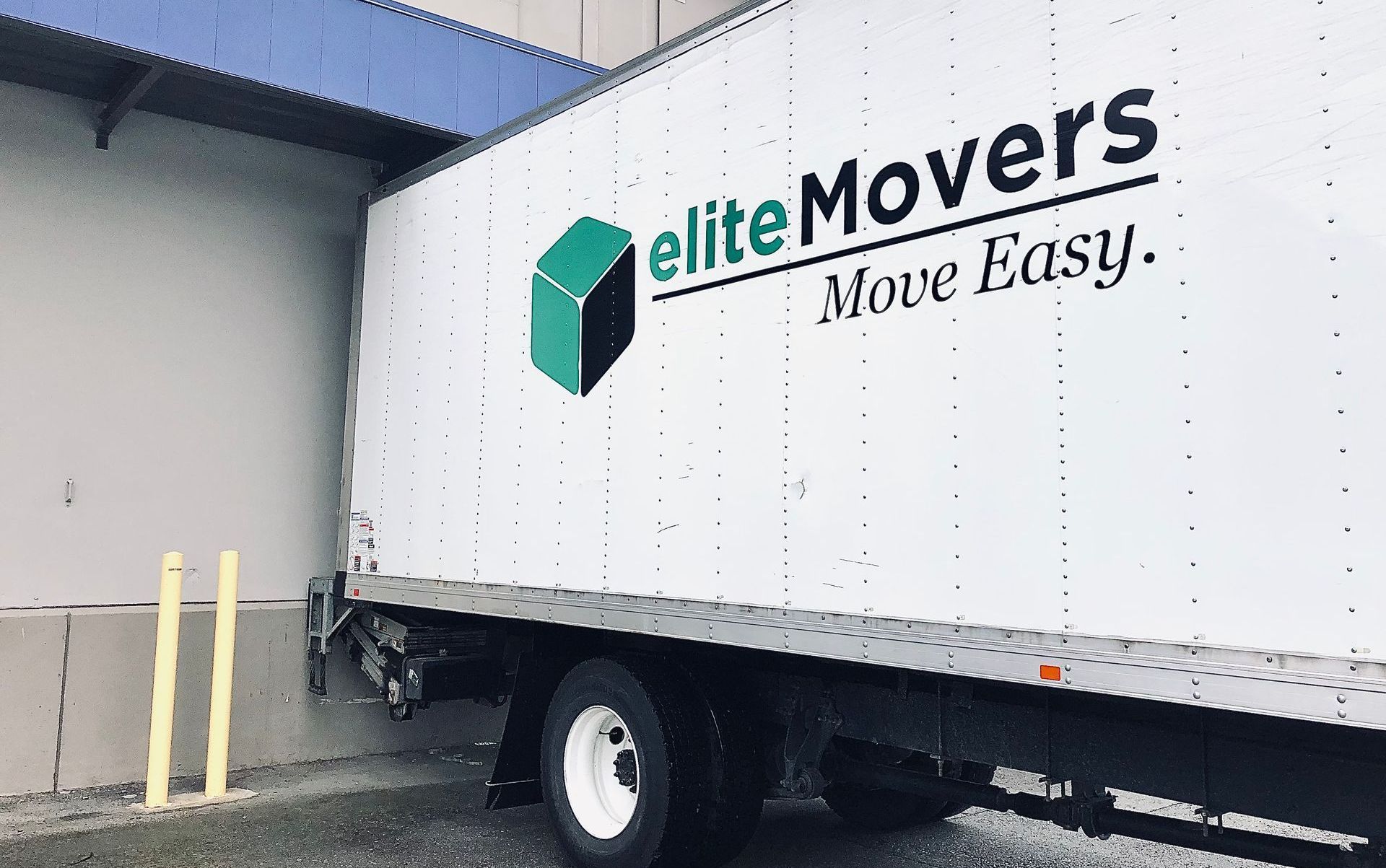 A girl packing her office things — Little Rock, AR — Elite Movers