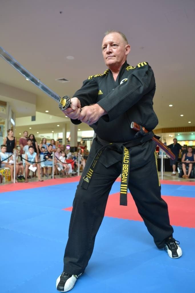 Student Getting A Trophy — Tae Kwon Do Lessons in Port Stephens