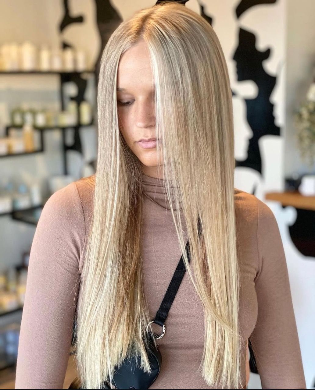 The inside of a moving truck filled with boxes and blankets.