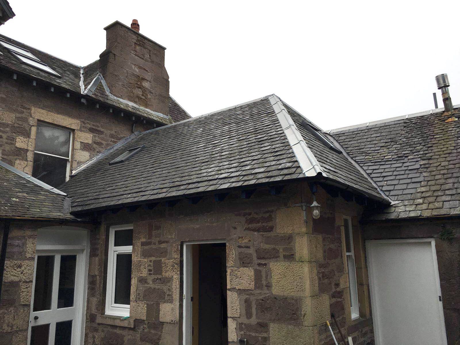 House with black tiling