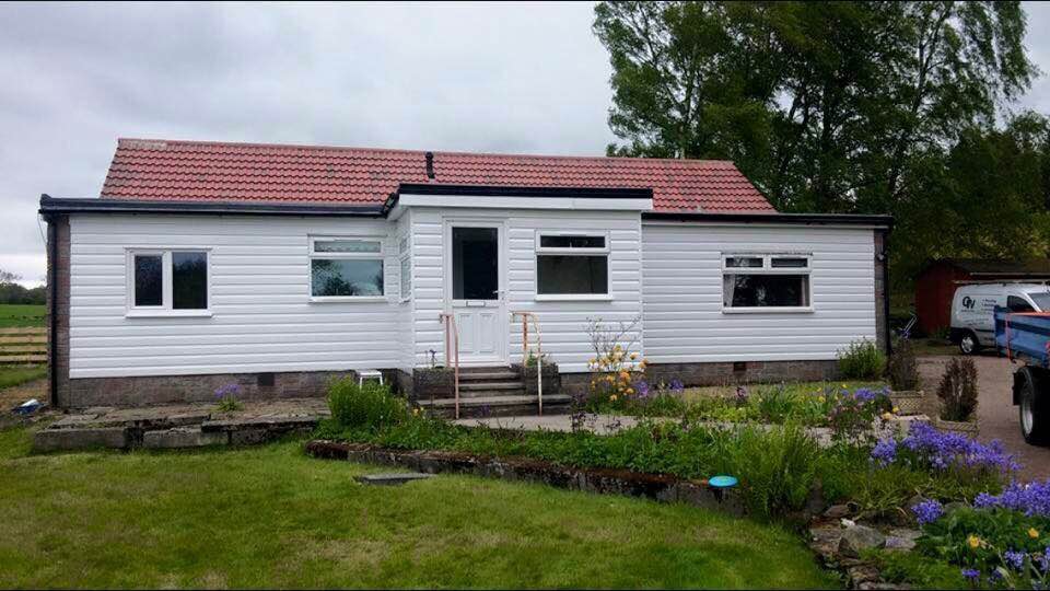 Farmhouse with red slates