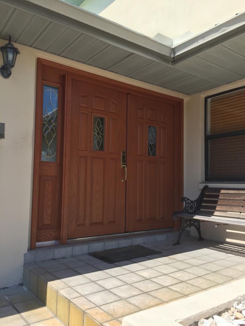 Nine Panel Double Fiberglass Door — Tampa, FL — DoorPro Entryways, Inc.