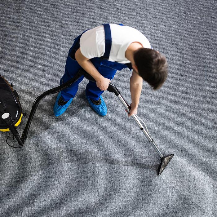 Man Cleaning Commercial Carpet