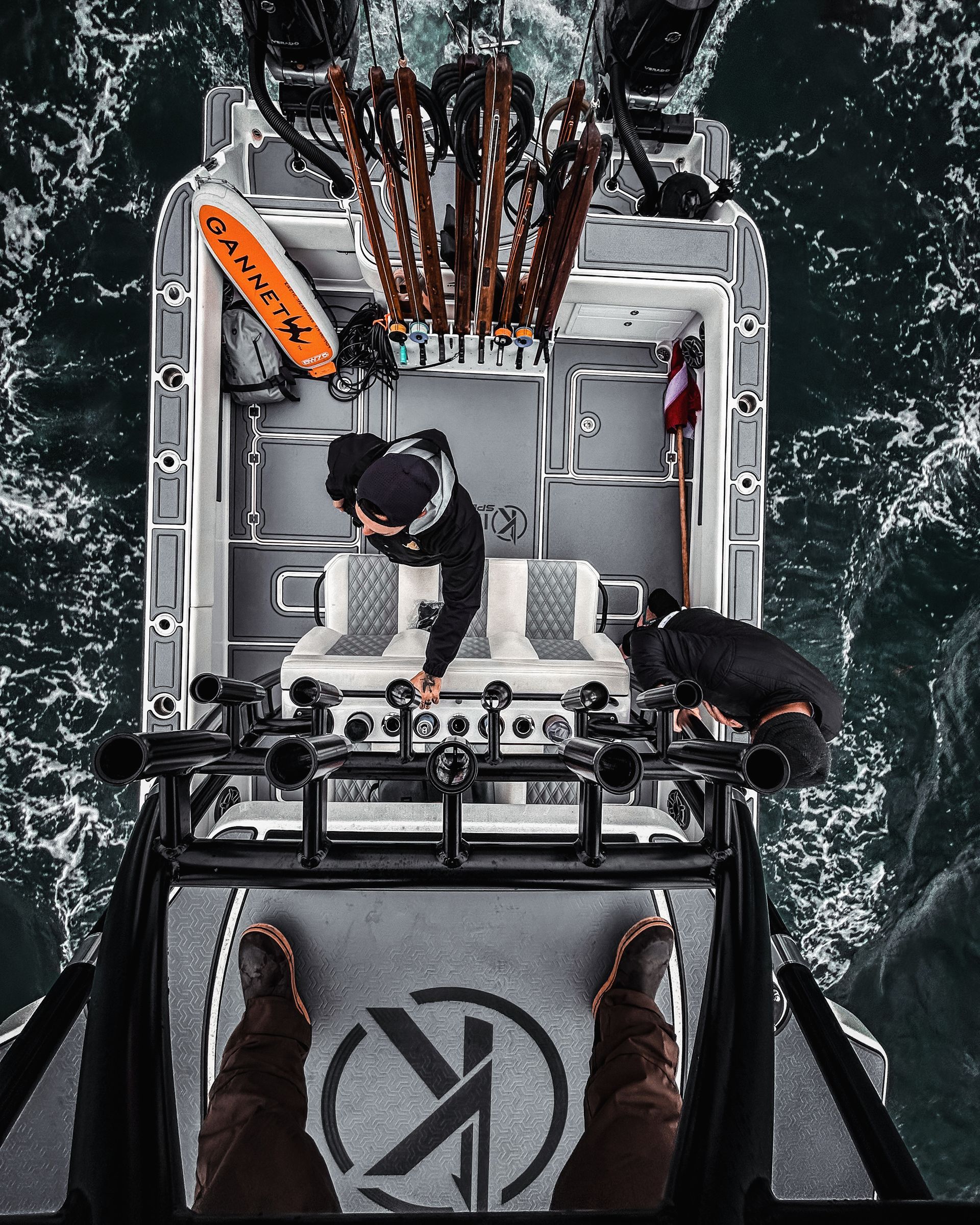 An aerial view of a boat with the letter k on the side