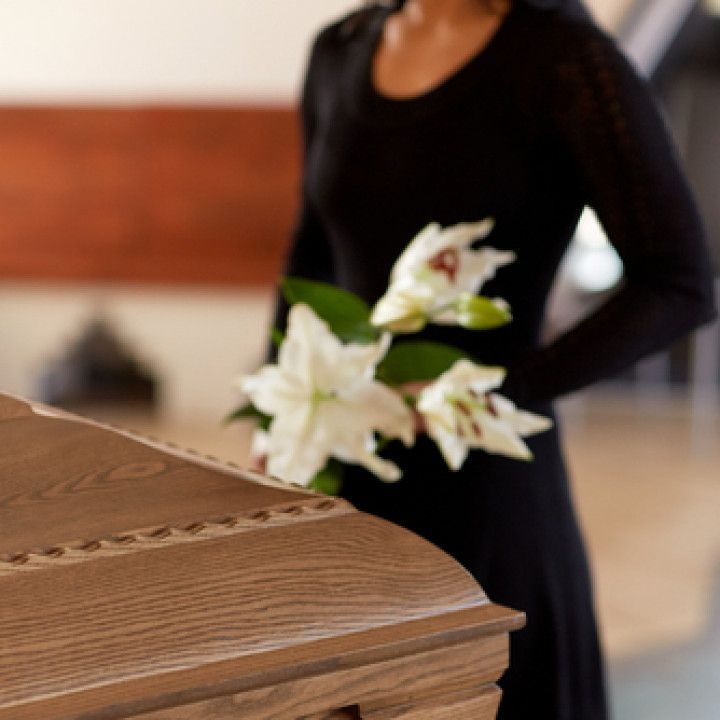 Woman Attending a Funeral