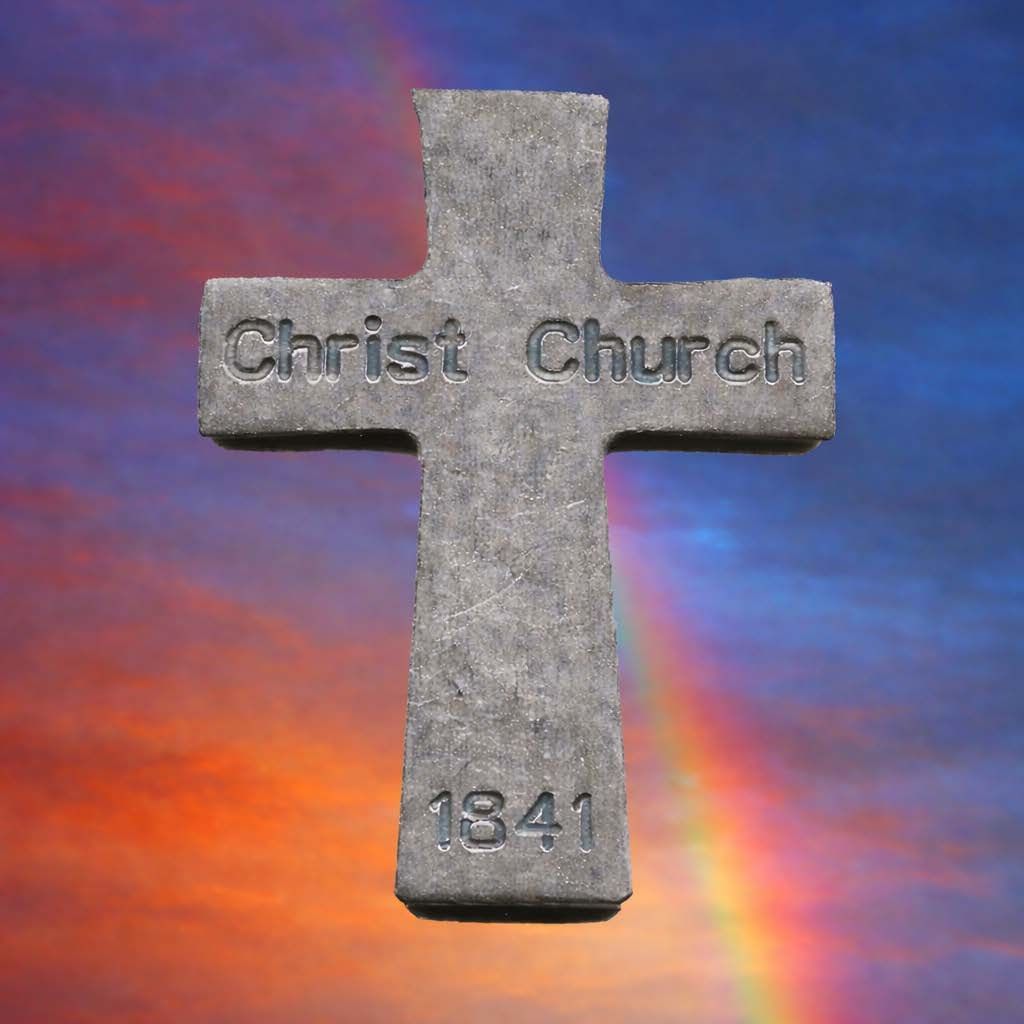 A stone cross marked 