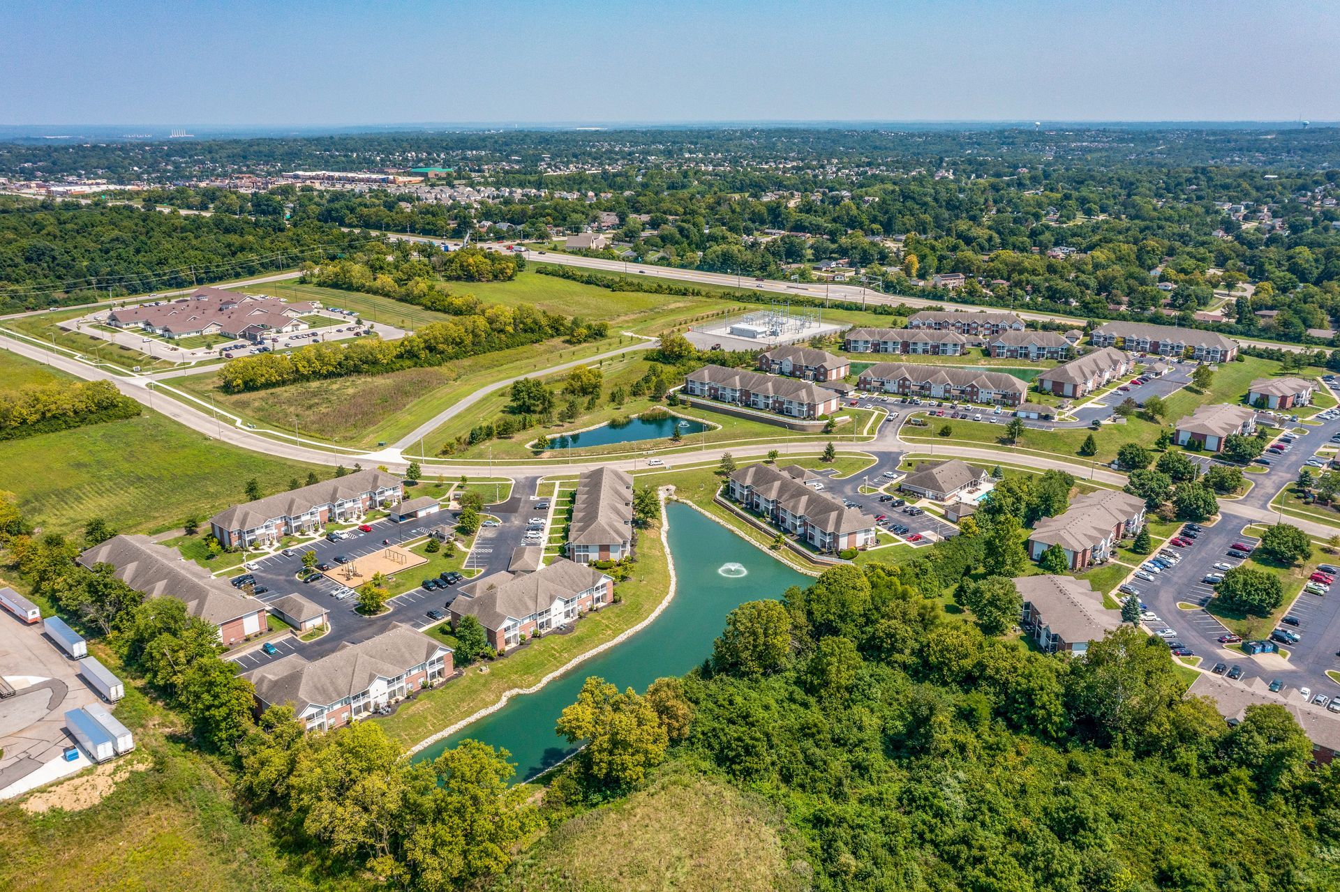 An aerial view of the community buildings and ponds.