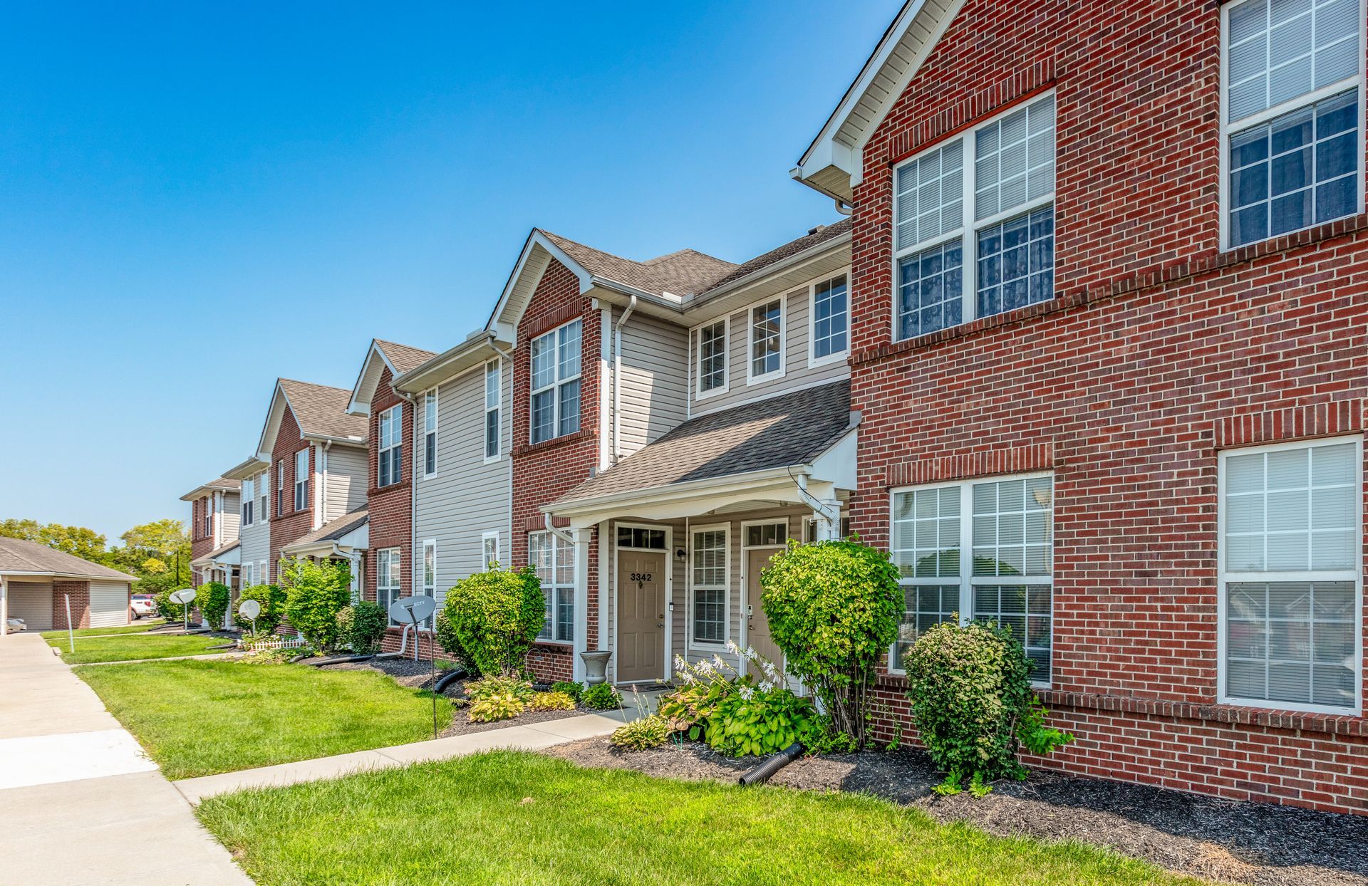 Exterior view of a building with private entrys.