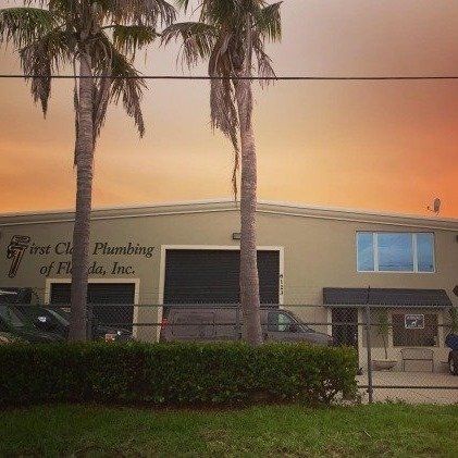 Installing White Pipes — Naples, FL — First Class Plumbing of Florida, Inc. Installing White Pipes — Naples, FL — First Class Plumbing of Florida, Inc.