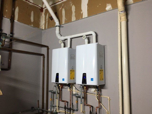 Laundromat Water Heater — Naples, FL — First Class Plumbing of Florida, Inc.