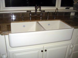 White Kitchen Sink — Naples, FL — First Class Plumbing of Florida, Inc.