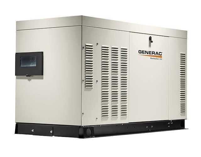 Generac home standby generator, beige with black base, in an outdoor setting.