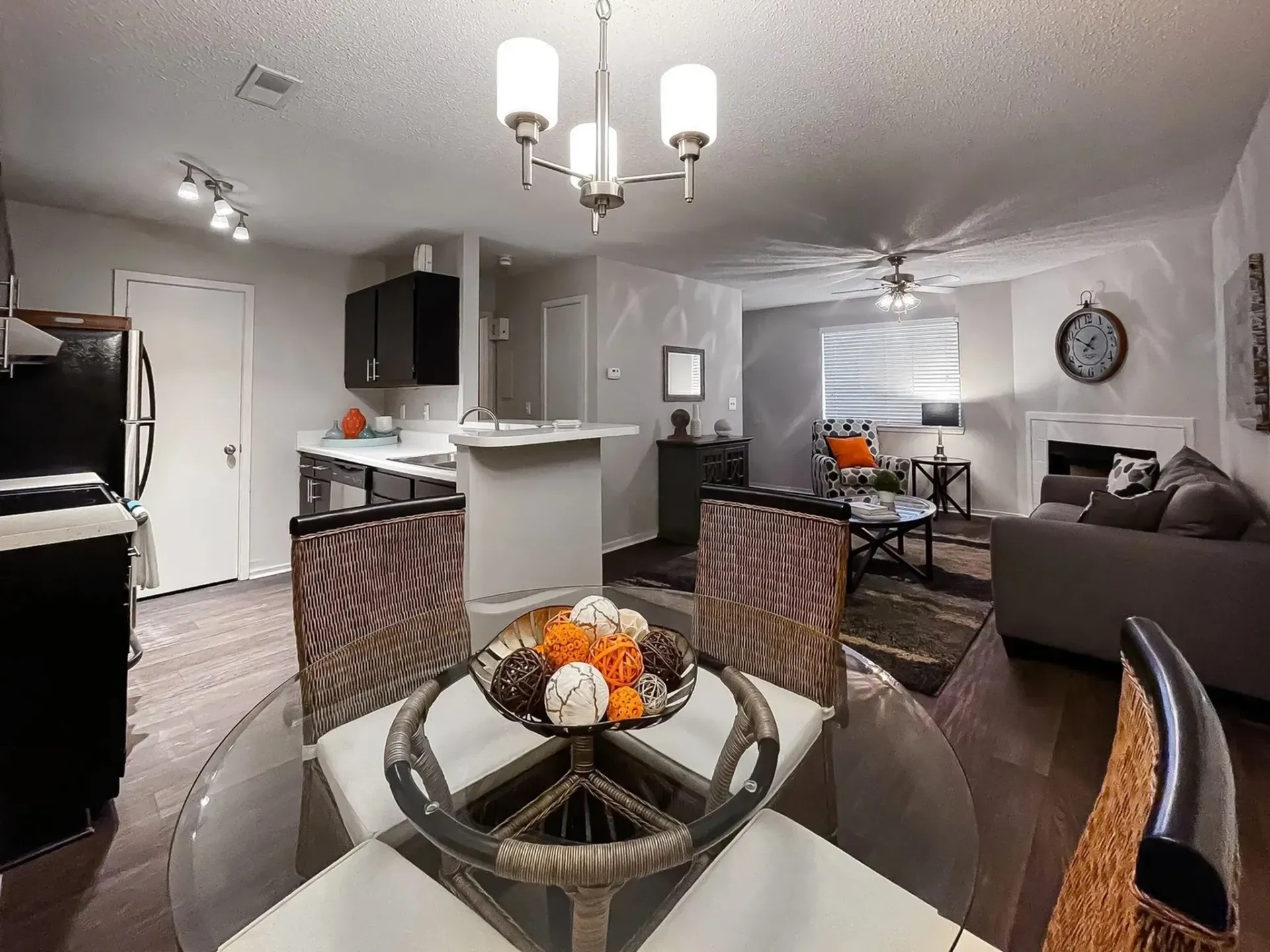 Stylishly furnished apartment living area and kitchen.