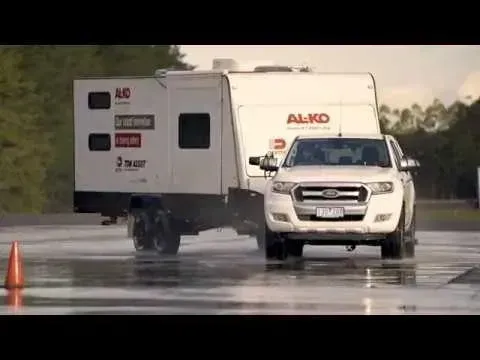 White Ford Ranger Truck Towing a White Caravan — Caravan and Trailer Clinic Geelong in Breakwater, VIC