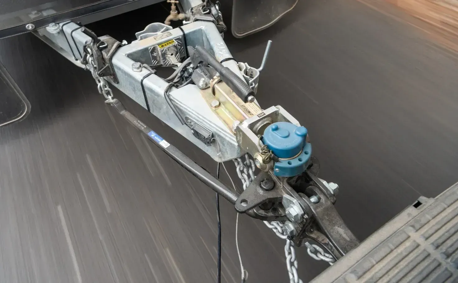 Trailer Hitch Attached to a Vehicle, Chains Visible — Caravan and Trailer Clinic Geelong in Breakwater, VIC