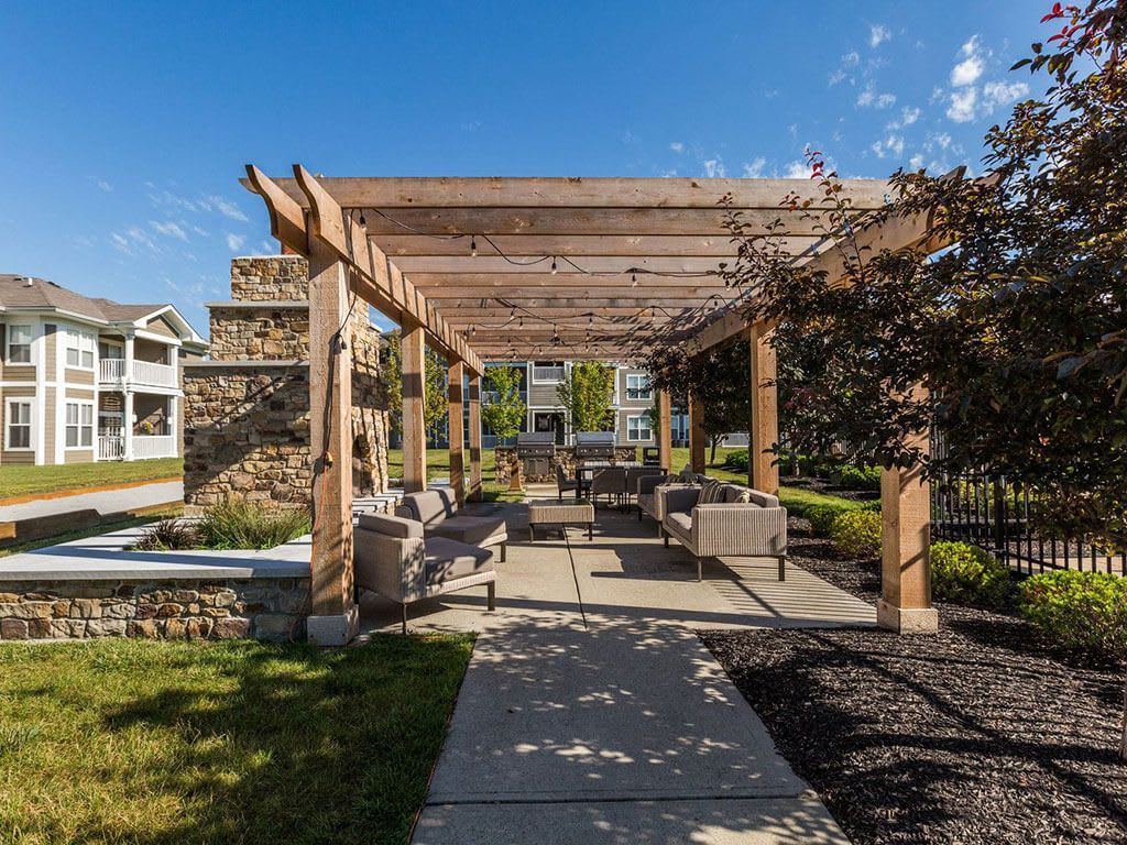 A couple cooking together in the kitchen.