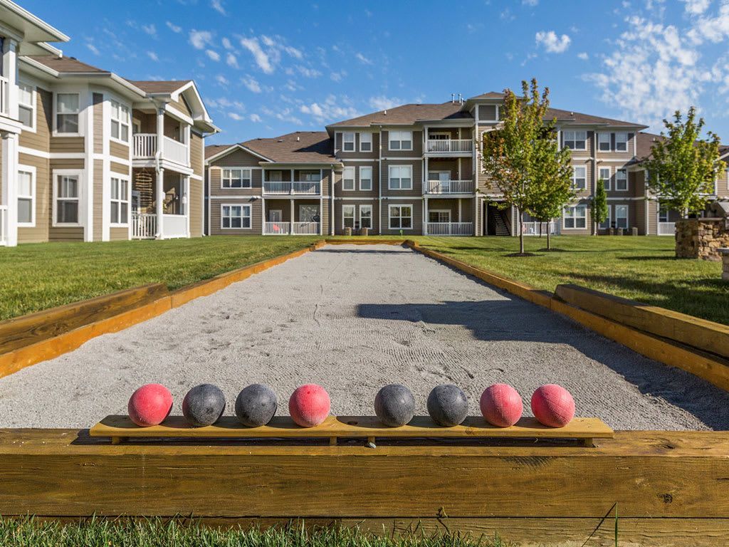 People working at Coffee Shop with Laptops and Headphones.