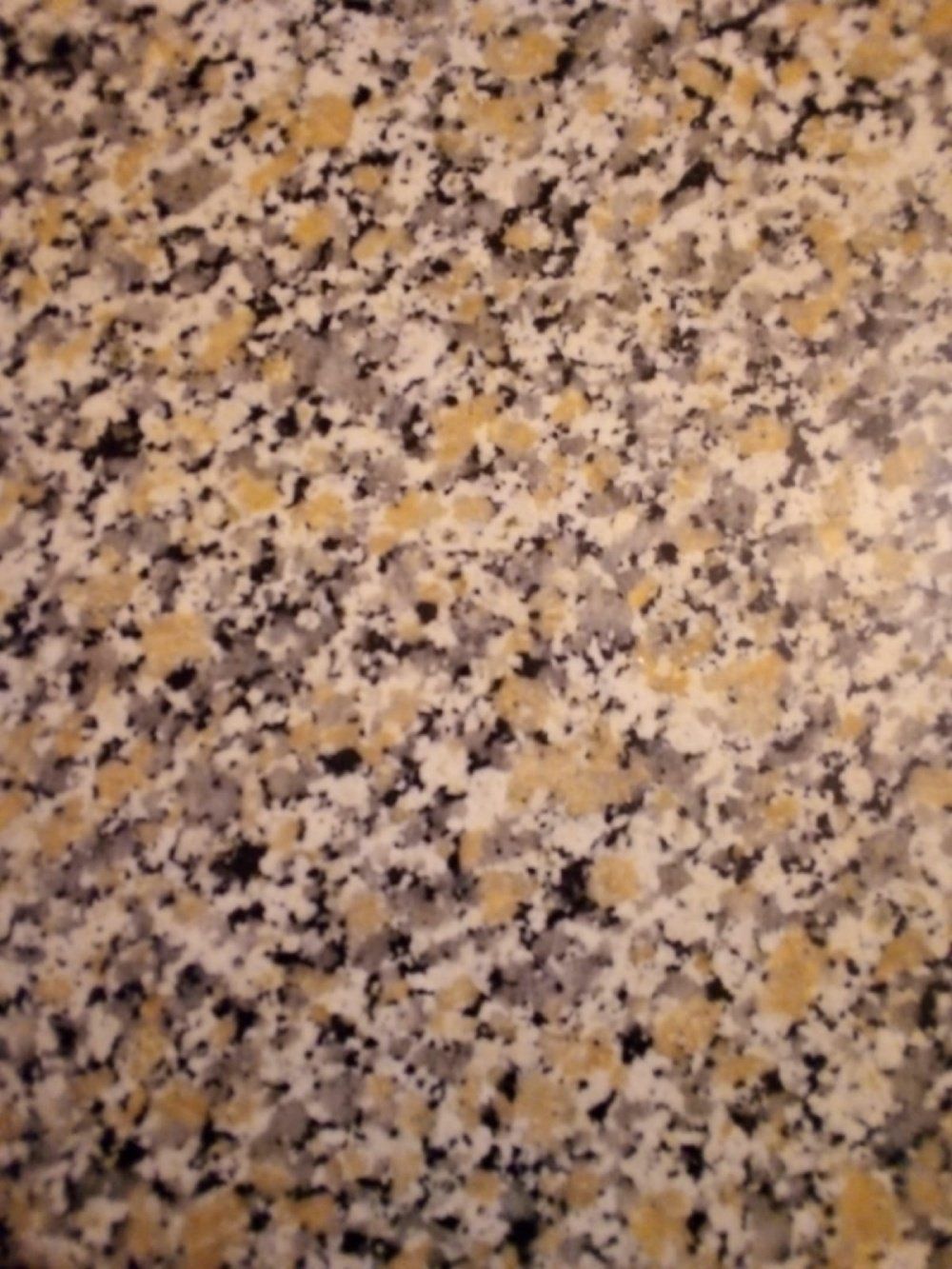 granito nero, grigio e oro