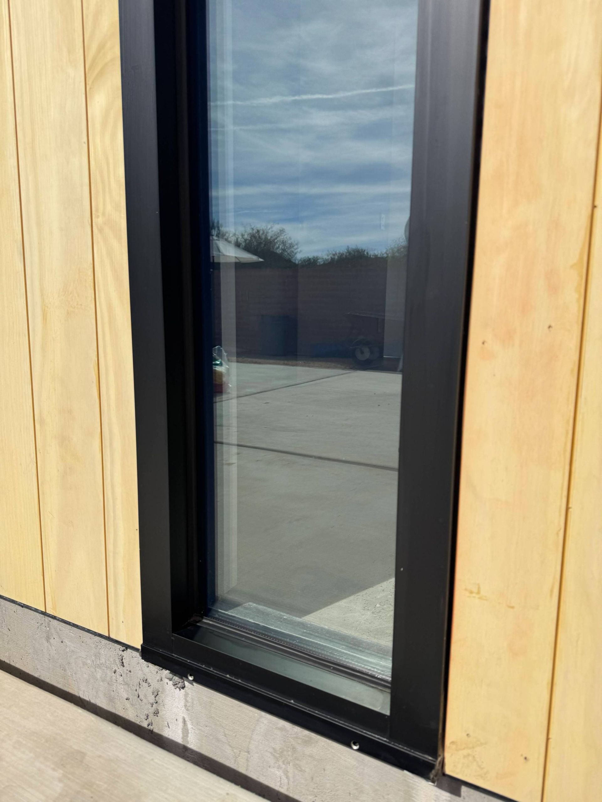A reflection of palm trees in a pool of water