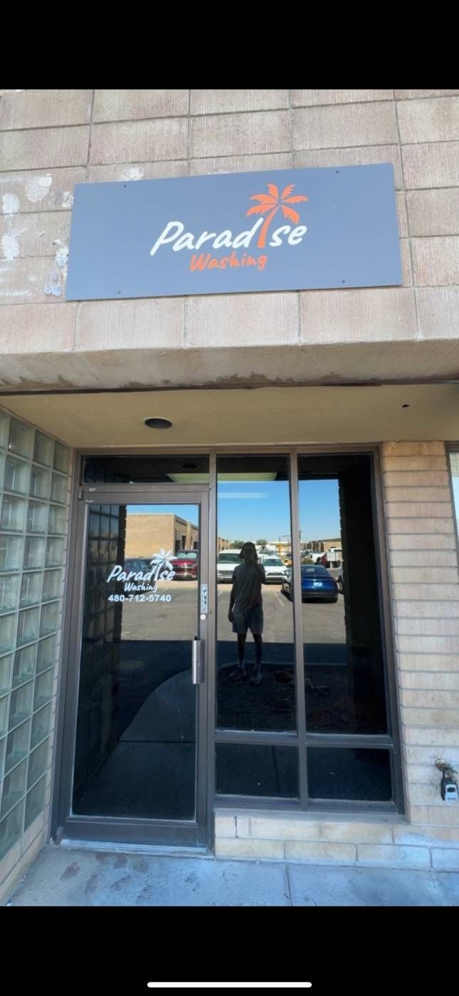 Sign above door reads 