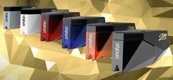 A Row of Ortofon Cartridges Sitting on Top of Each Other on a Table — Complete Audio in Maroochydore, QLD