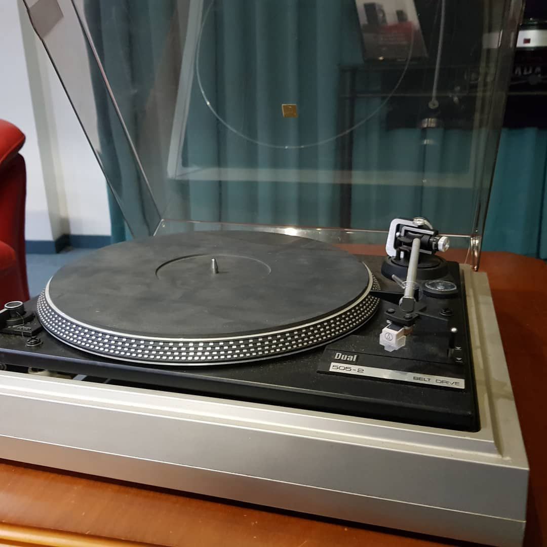 A Record Player is Sitting on a Wooden Table — Complete Audio in Maroochydore, QLD