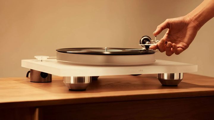 A Person is Playing a Record on a Record Player — Complete Audio in Maroochydore, QLD