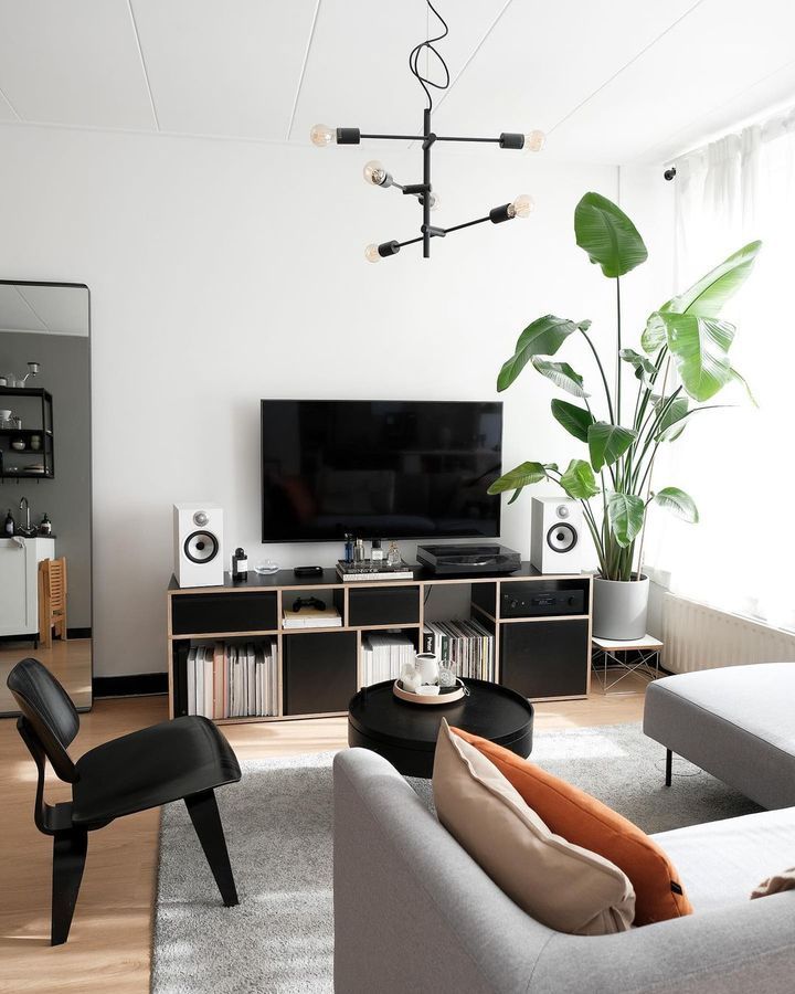 A Living Room With a Couch a Chair and a Television — Complete Audio in Maroochydore, QLD