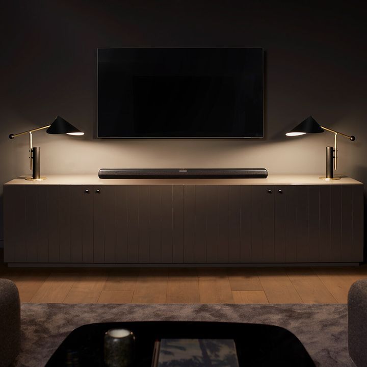 A Living Room With Two Lamps and a Flat Screen TV — Complete Audio in Maroochydore, QLD