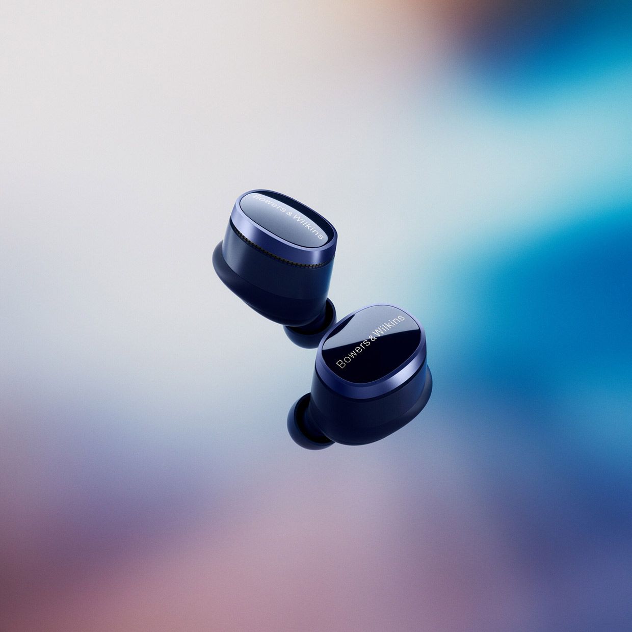 A Pair of Ear Buds on A Colourful Background — Complete Audio in Maroochydore, QLD