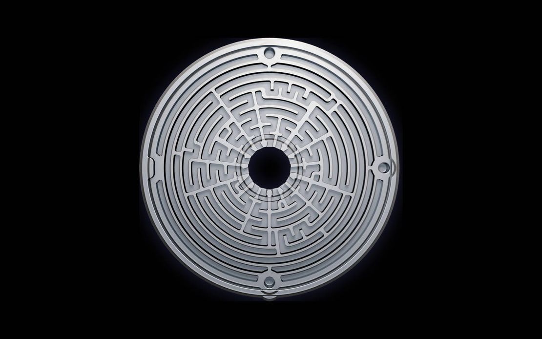 A Close Up of a Circular Object With a Hole in the Middle on a Black Background — Complete Audio in Maroochydore, QLD