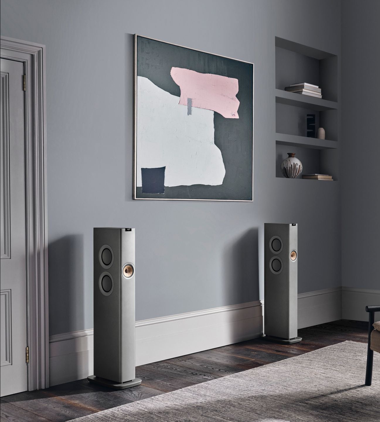 A Pair of Speakers Sitting On The Floor Beneath A Painting — Complete Audio in Maroochydore, QLD