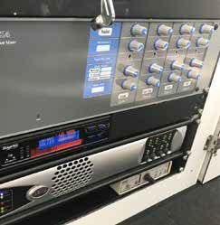 A Bunch of Electronics Are Stacked on Top of Each Other on a Shelf — Complete Audio in Maroochydore, QLD