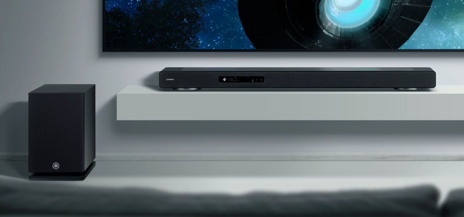 Black Soundbar and Subwoofer on a White Shelf Under a Tv — Complete Audio in Maroochydore, QLD