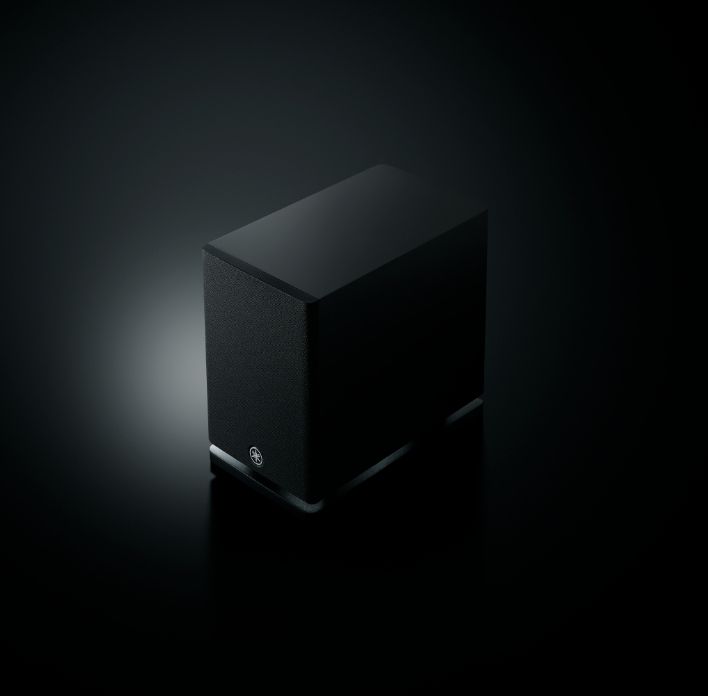 Black Cube-shaped Speaker on a Dark Surface, Subtly Illuminated — Complete Audio in Maroochydore, QLD