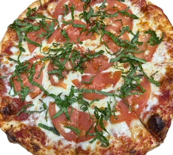 margherita pizza topped with sliced tomatoes and fresh basil